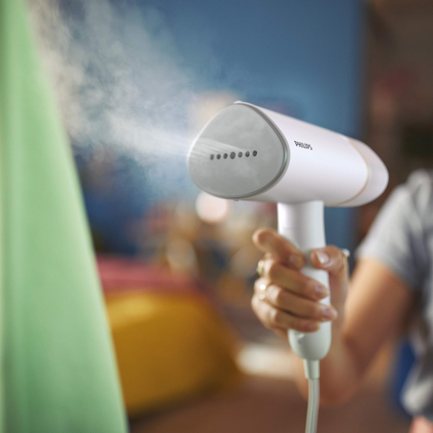 اتو و بخارشور دستی لباس قابل حمل و سبک Philips